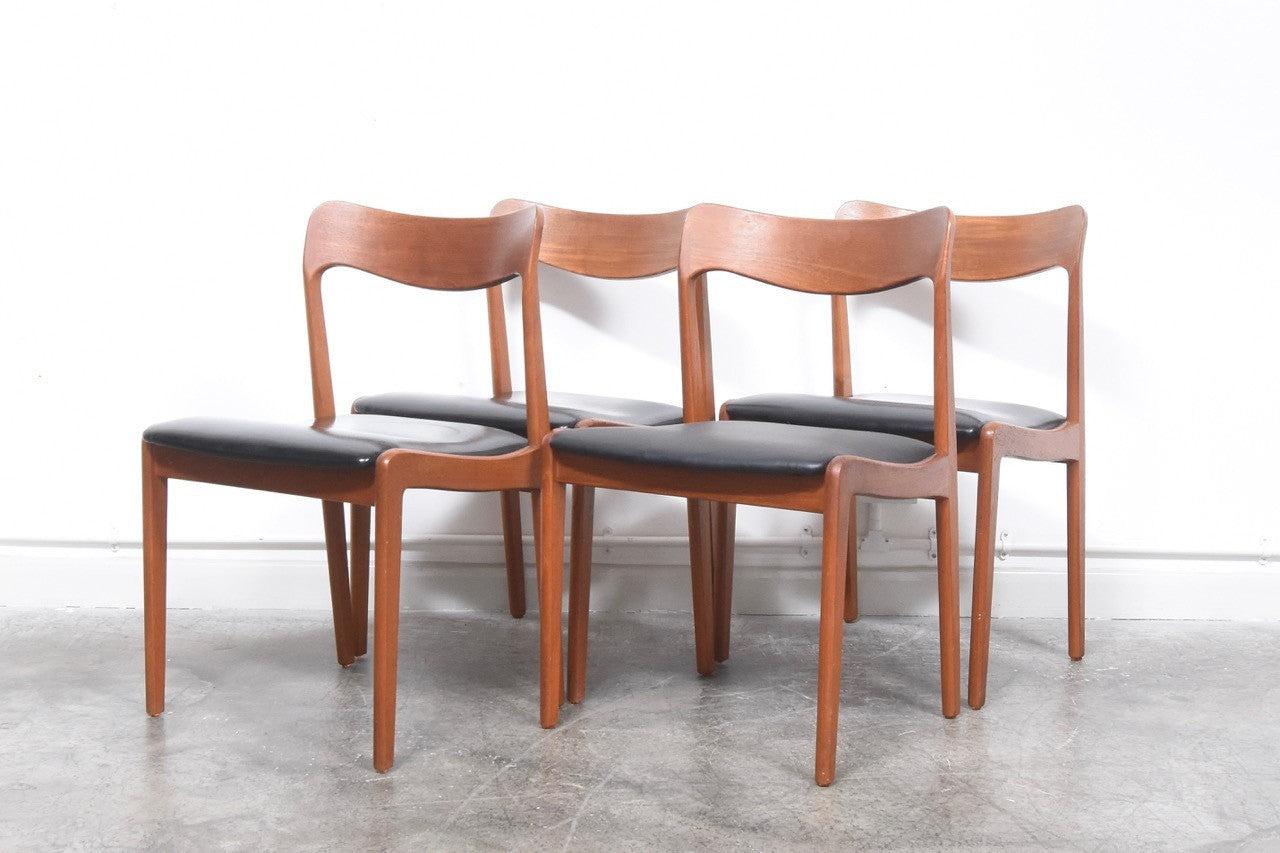 Set of four teak dining chairs