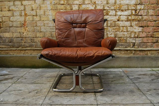 Leather lounge chair with foot stool