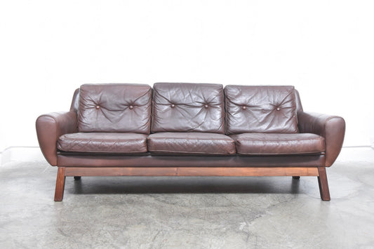 1960s leather sofa on rosewood base