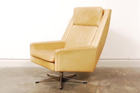 High back lounger in cream leather