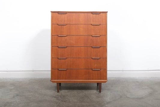 Large chest of teak drawers