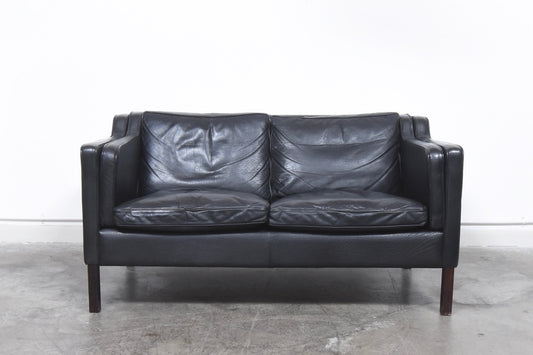 Black leather two seater by Stouby