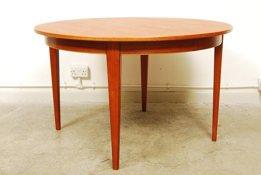 Teak dining table by Omann Junior