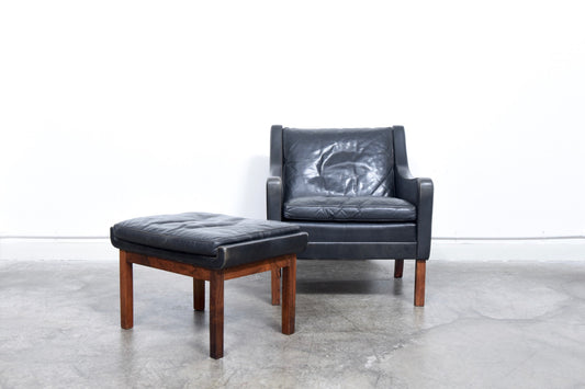 Leather club chair + matching foot stool