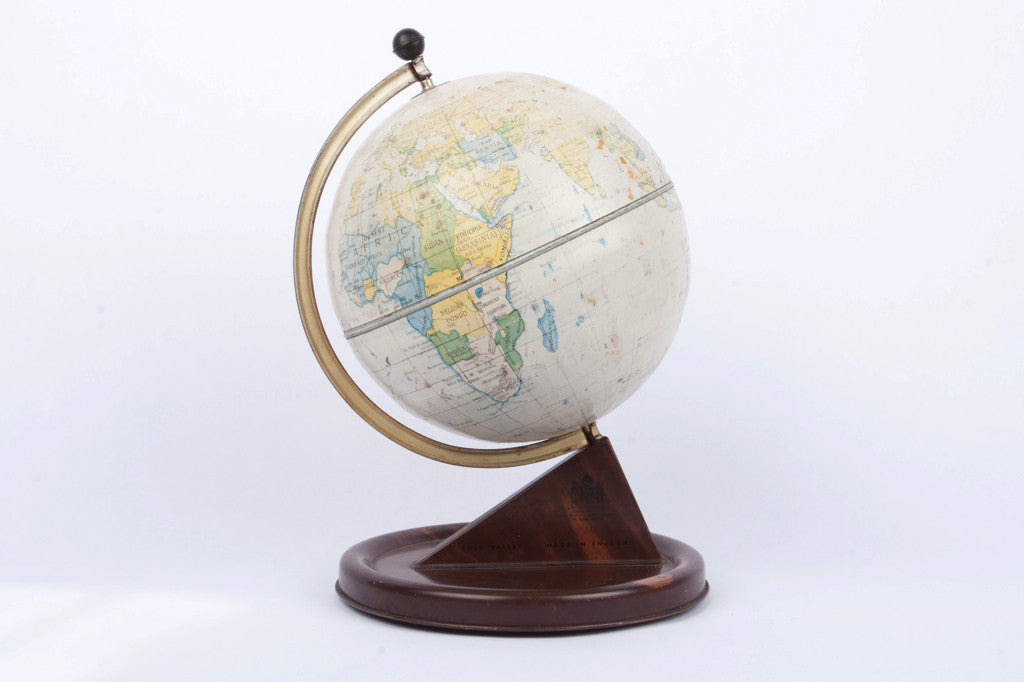 Vintage globe on wooden base