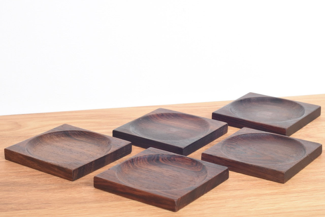 Set of five solid rosewood coasters