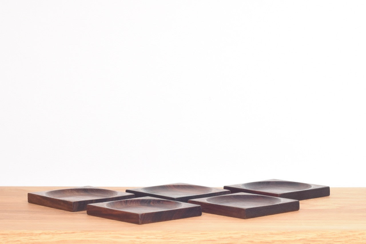 Set of five solid rosewood coasters