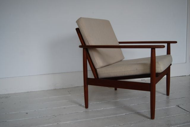 Lounge chair in oiled teak