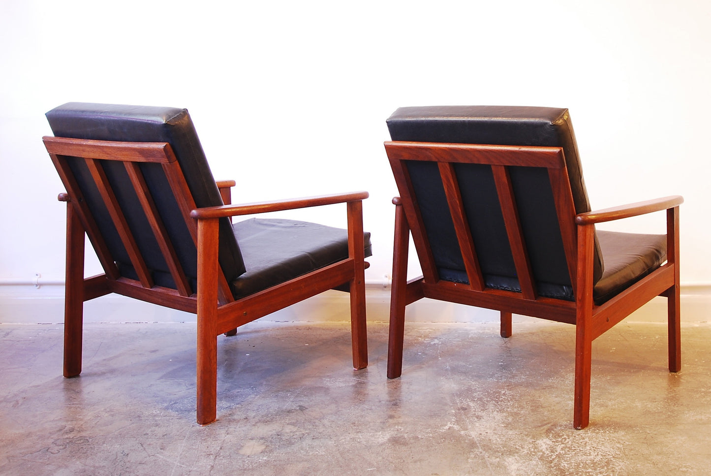 Pair of teak lounge chairs