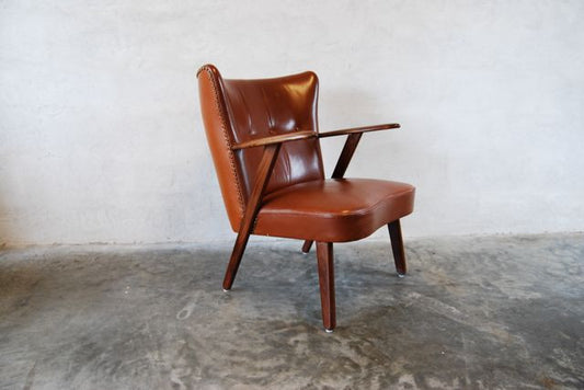 Leather occasional chair in teak