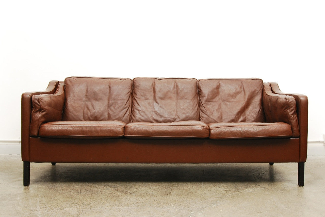 Three seat chocolate brown leather sofa
