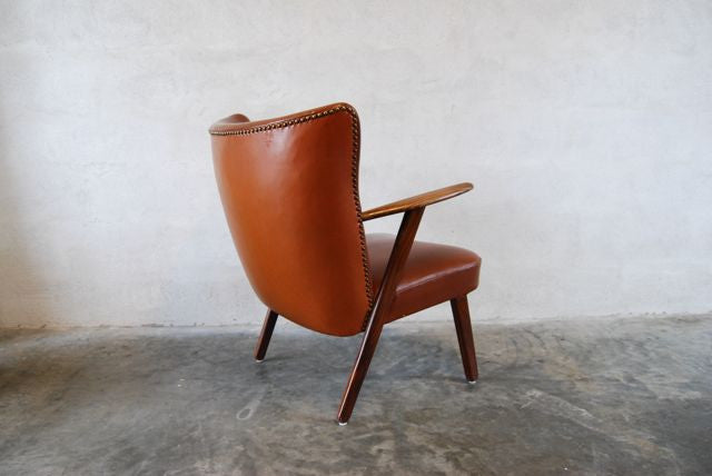 Leather occasional chair in teak