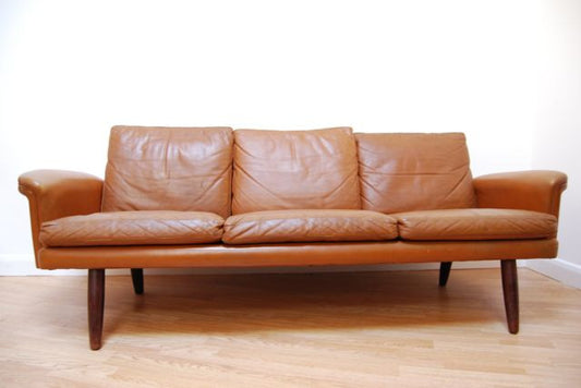 Three seat leather sofa in tan leather