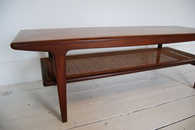 Coffee table with cane shelf