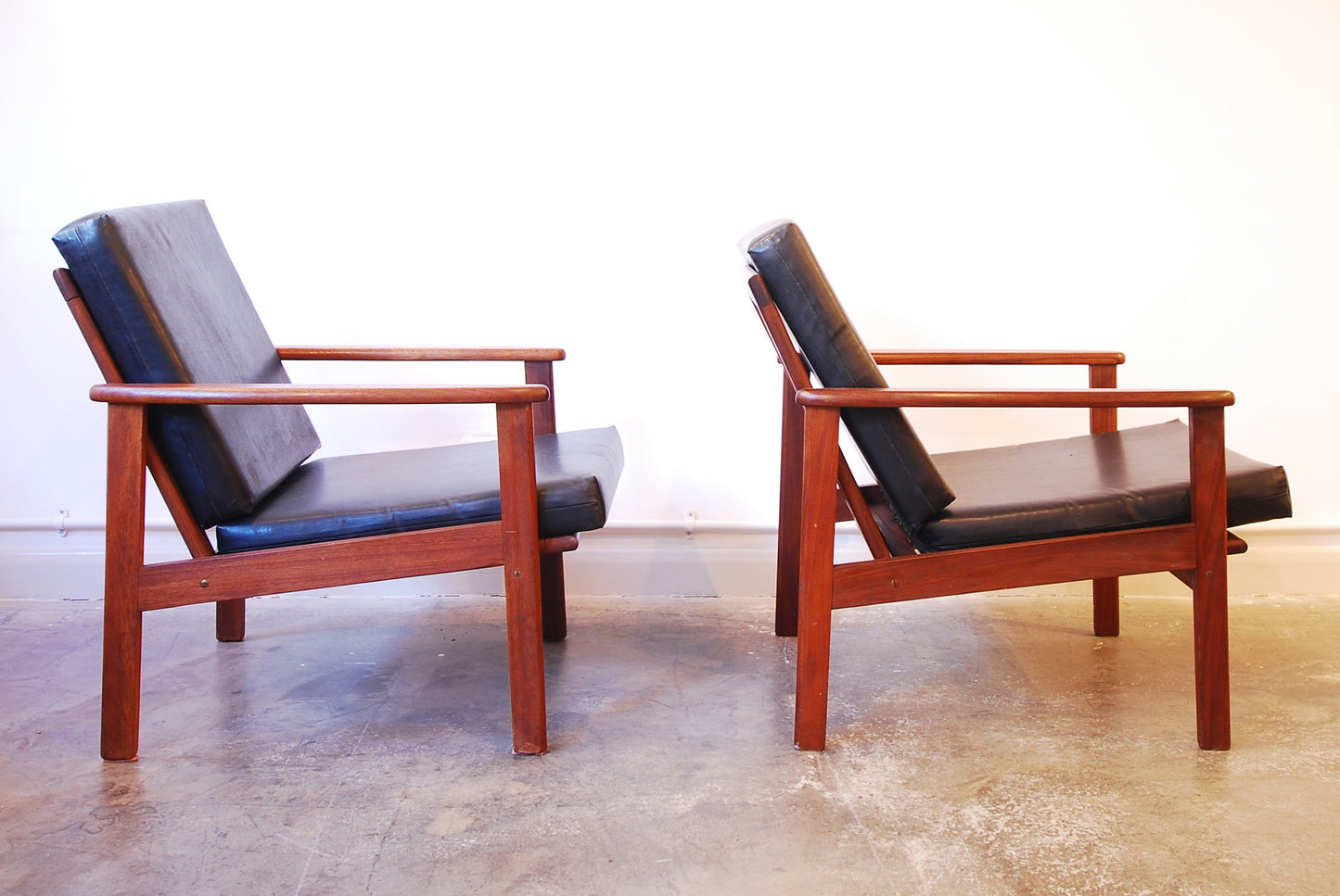 Pair of teak lounge chairs