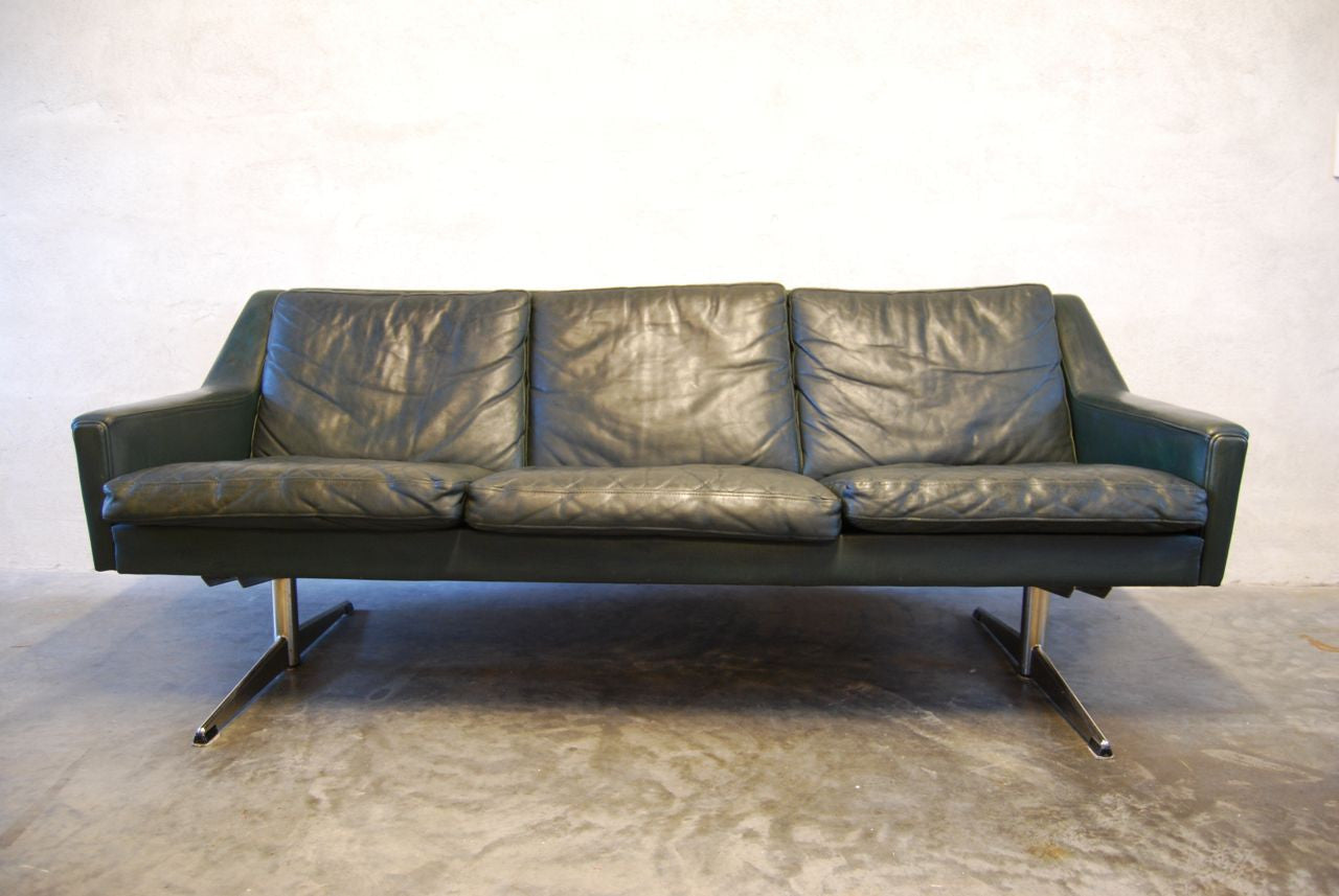 Three seat leather sofa in forest green
