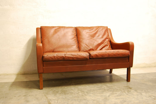 Maroon leather two seater