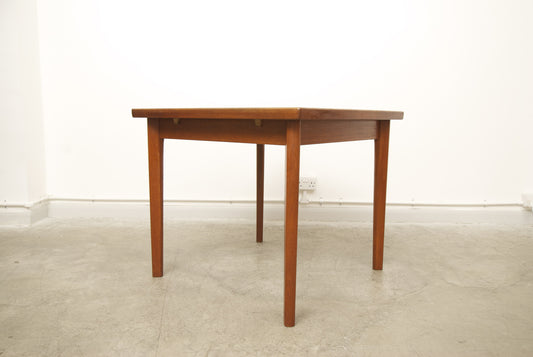 Square teak dining table