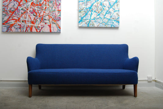 Newly upholstered three seat organic sofa