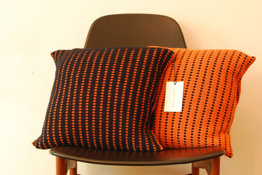 Reversible cushions in lambs wool