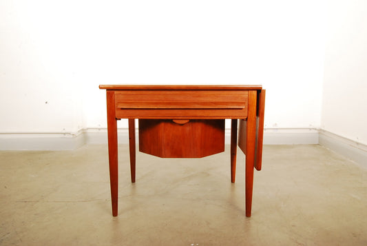 Extending teak sewing table