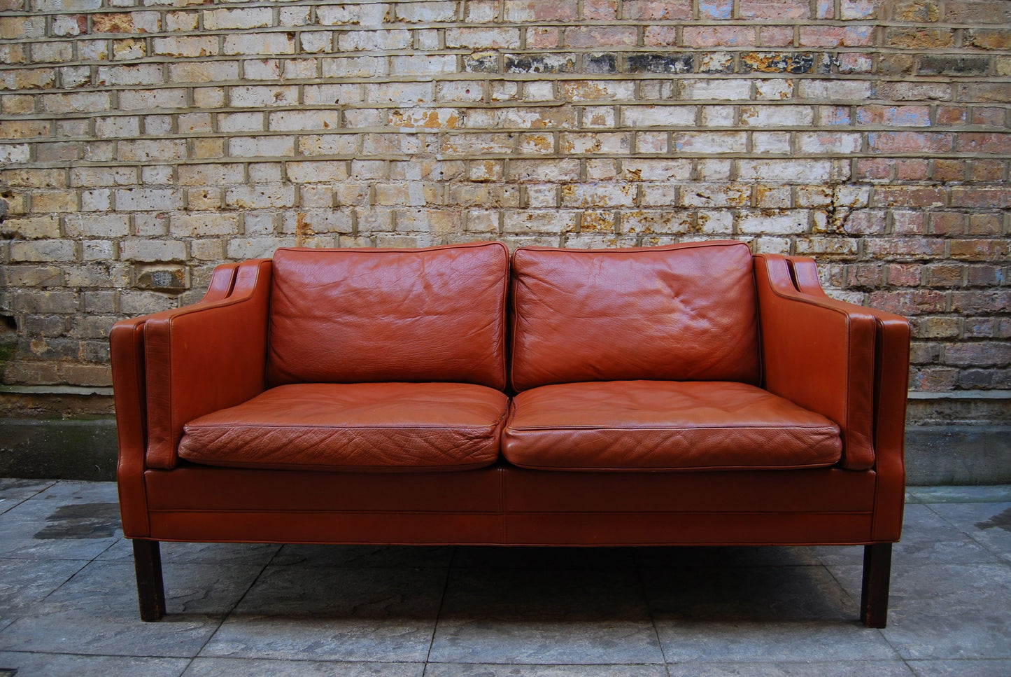 Two seat leather sofa in style of Mogensen