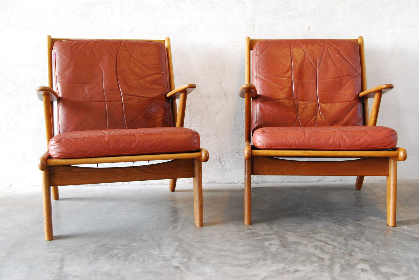 Pair of oak lounge chairs by Poul Volther