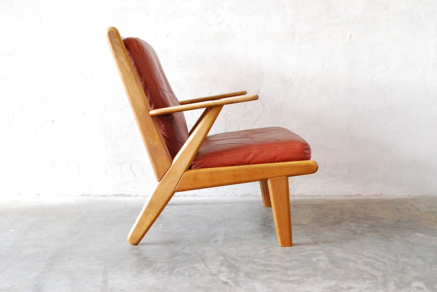 Pair of oak lounge chairs by Poul Volther