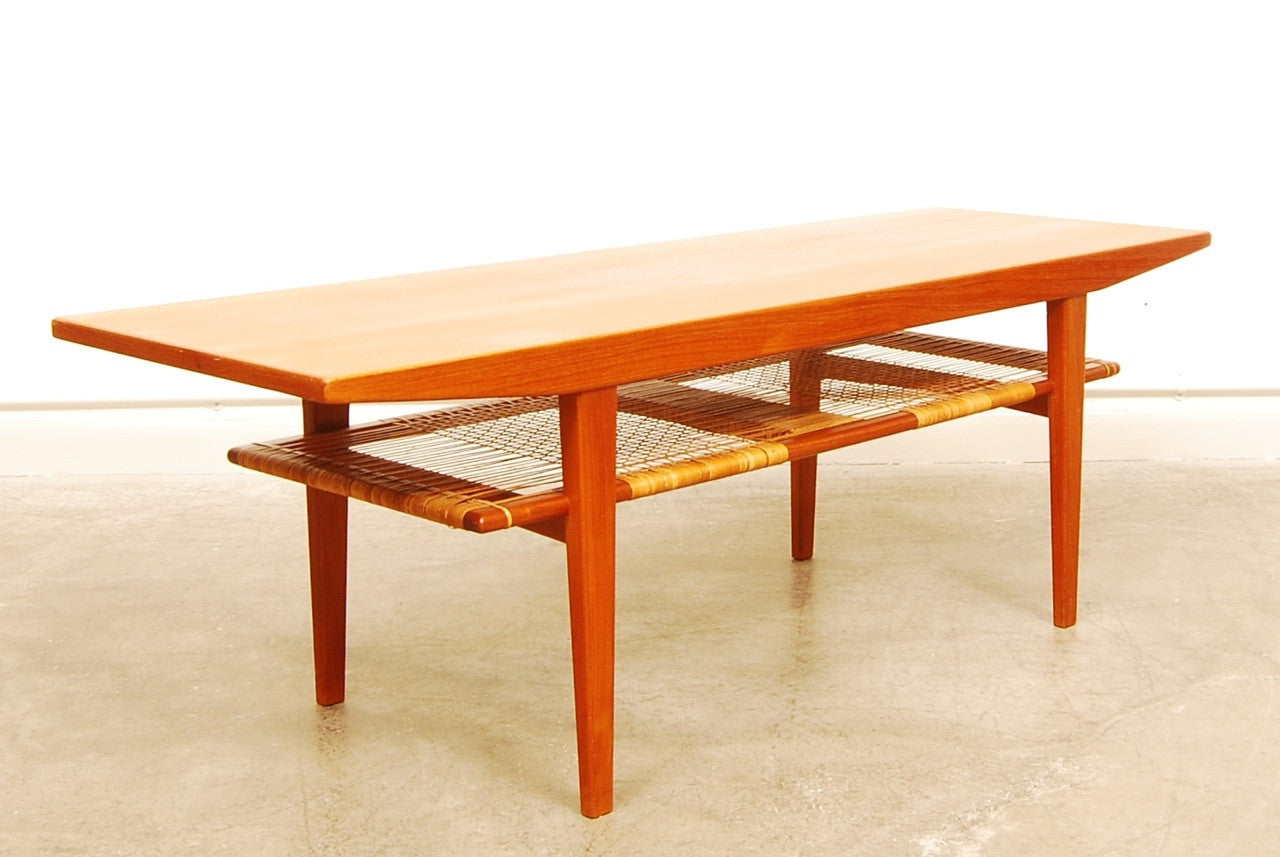 Teak coffee table with magazine shelf