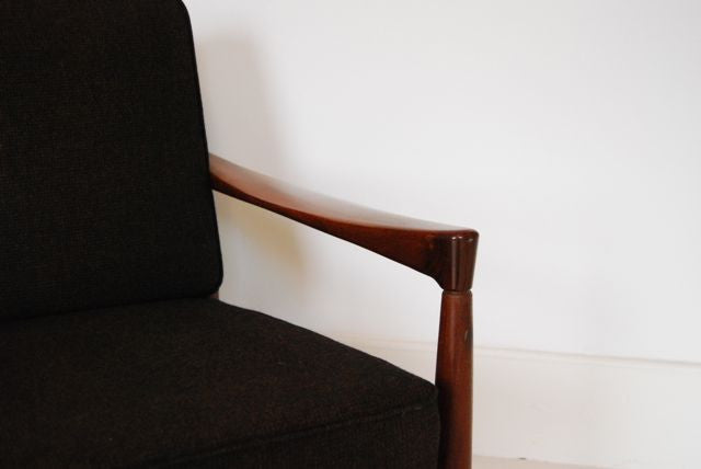 Teak lounge chair in brown wool