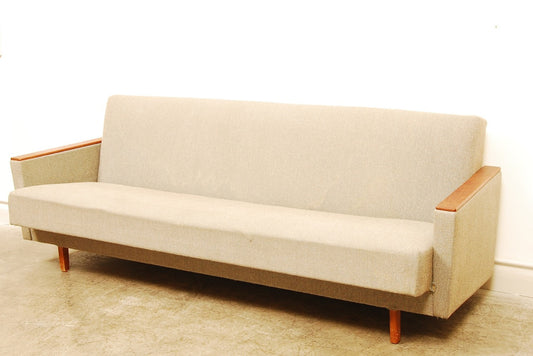 Three seat sofabed with teak arms