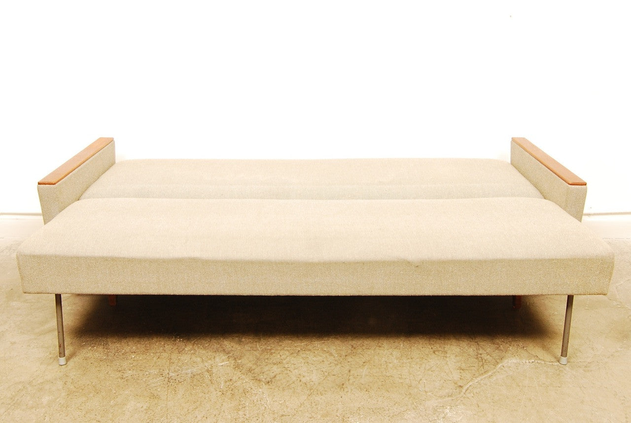 Three seat sofabed with teak arms