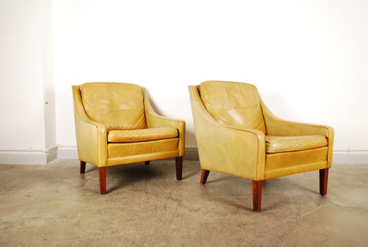 Pair of leather club chairs