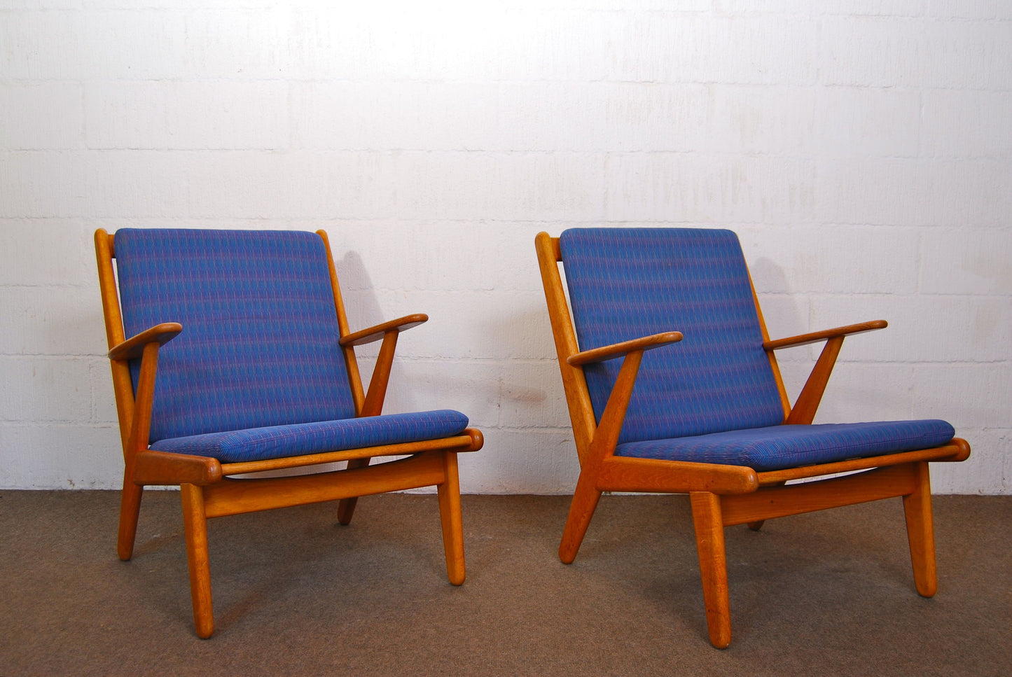 Pair of lounge chairs by Poul M. Volther