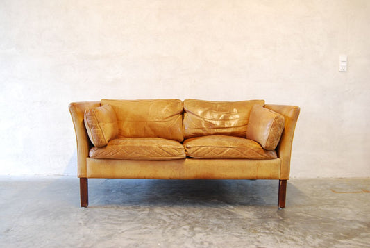 Two seat sofa in buffalo leather