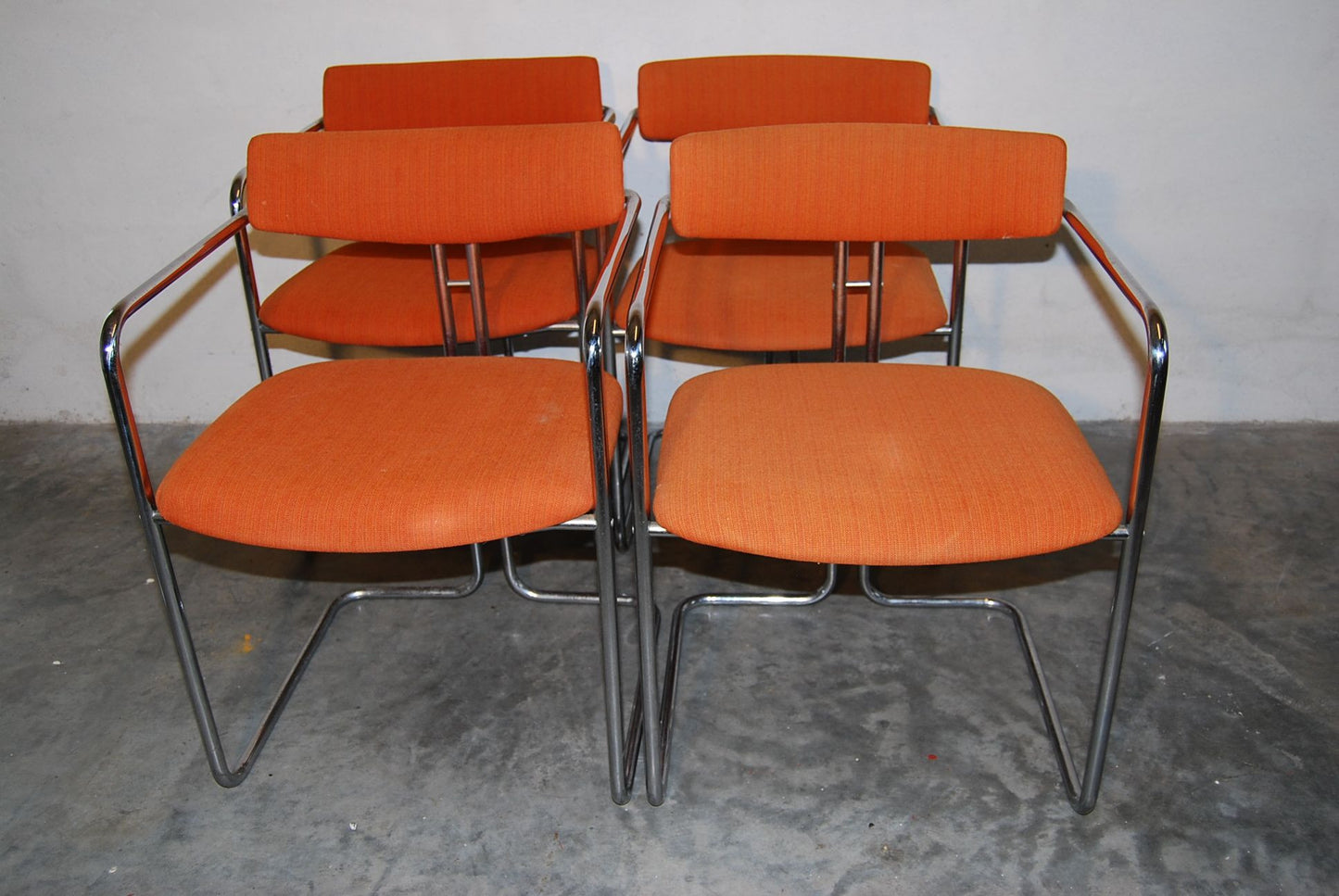 Set of Four Orange and Chrome Dining Chairs