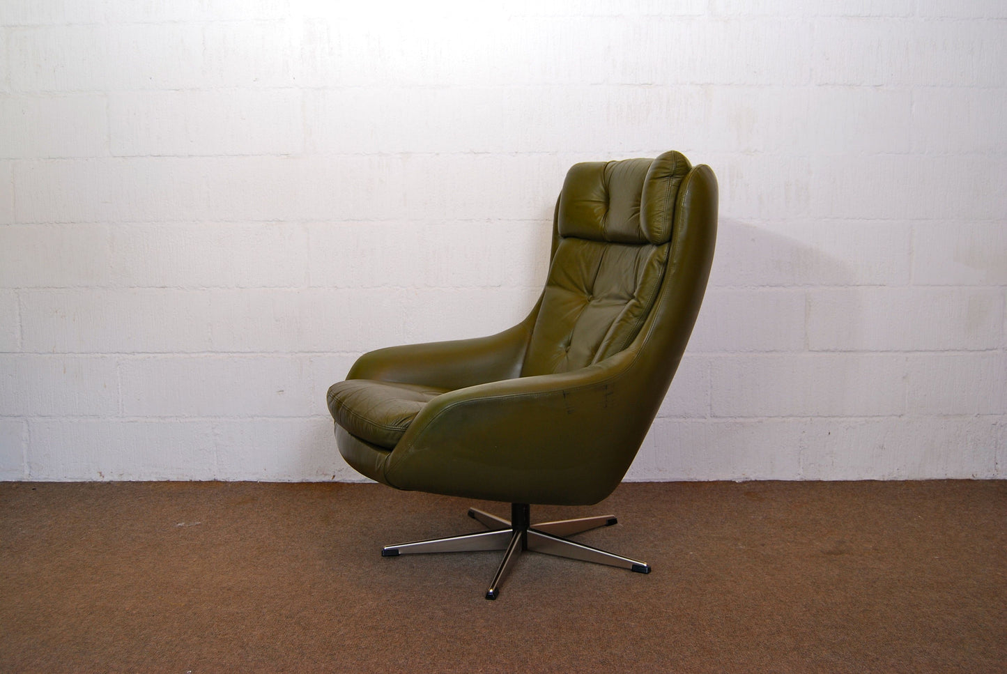 Forest green leather bucket chair
