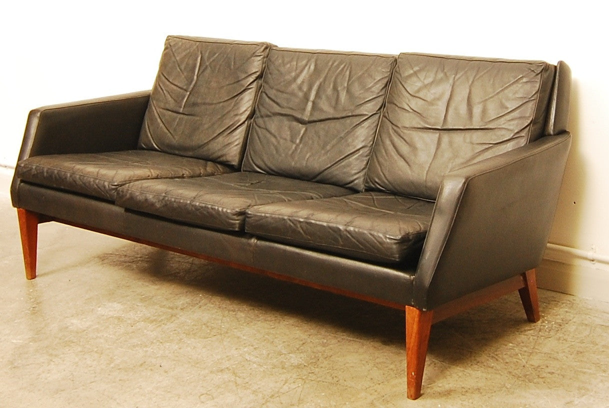 Three seat black leather sofa. Denmark, 1960s