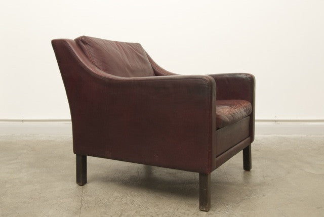 Maroon leather club chair