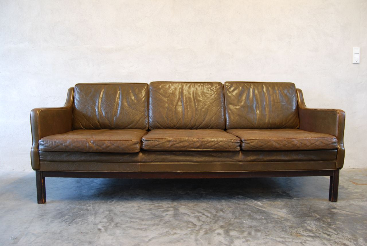 Three seat leather sofa in nougat