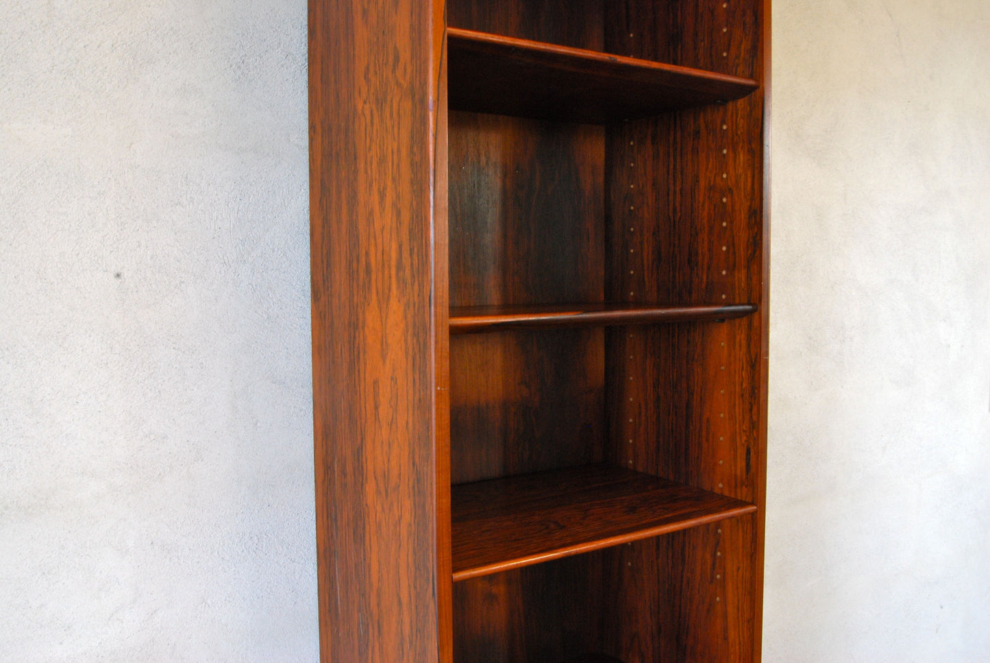 Narrow rosewood bookshelf