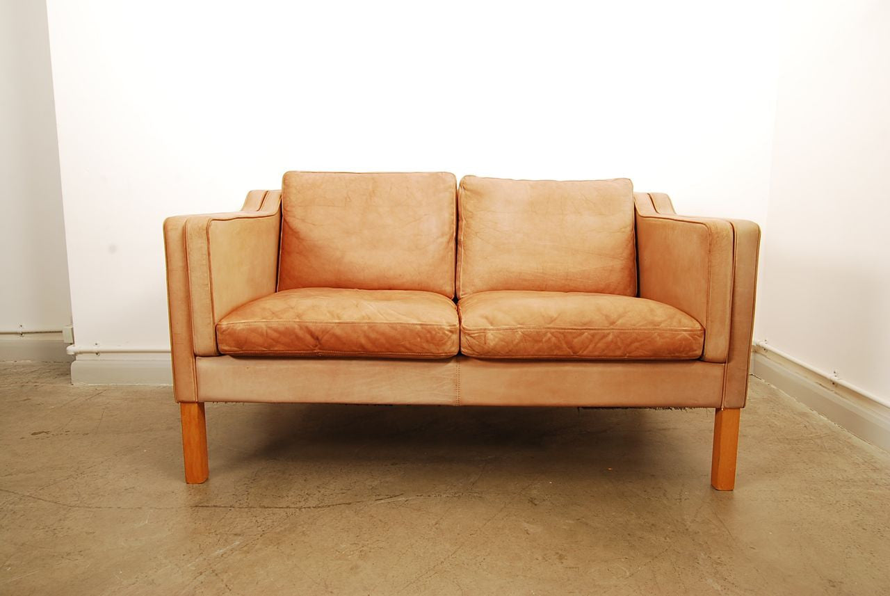 Two seat leather sofa in style of Mogensen