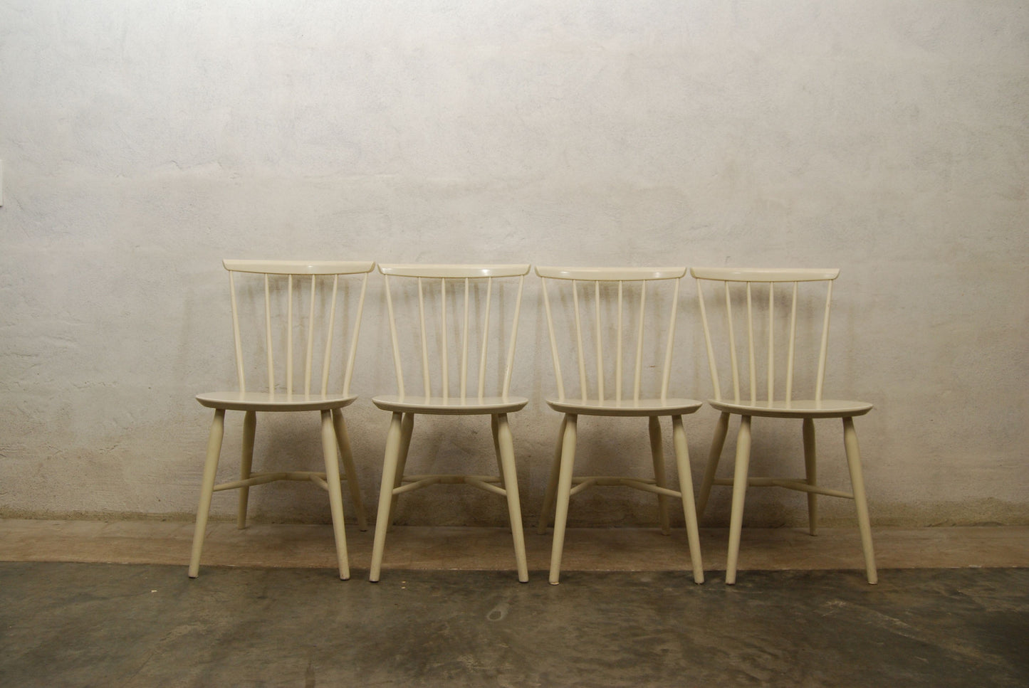 Set of four spindle back dining chairs
