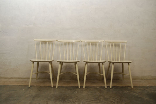 Set of four spindle back dining chairs