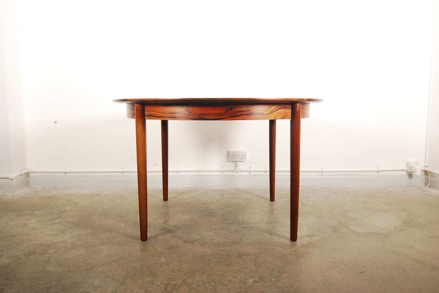 Rosewood dining table with drop-in leaves