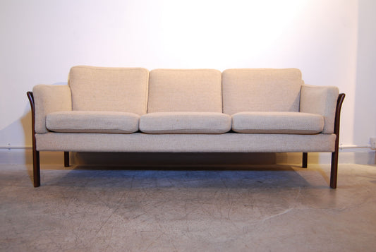 Scalloped back three seat sofa in wool