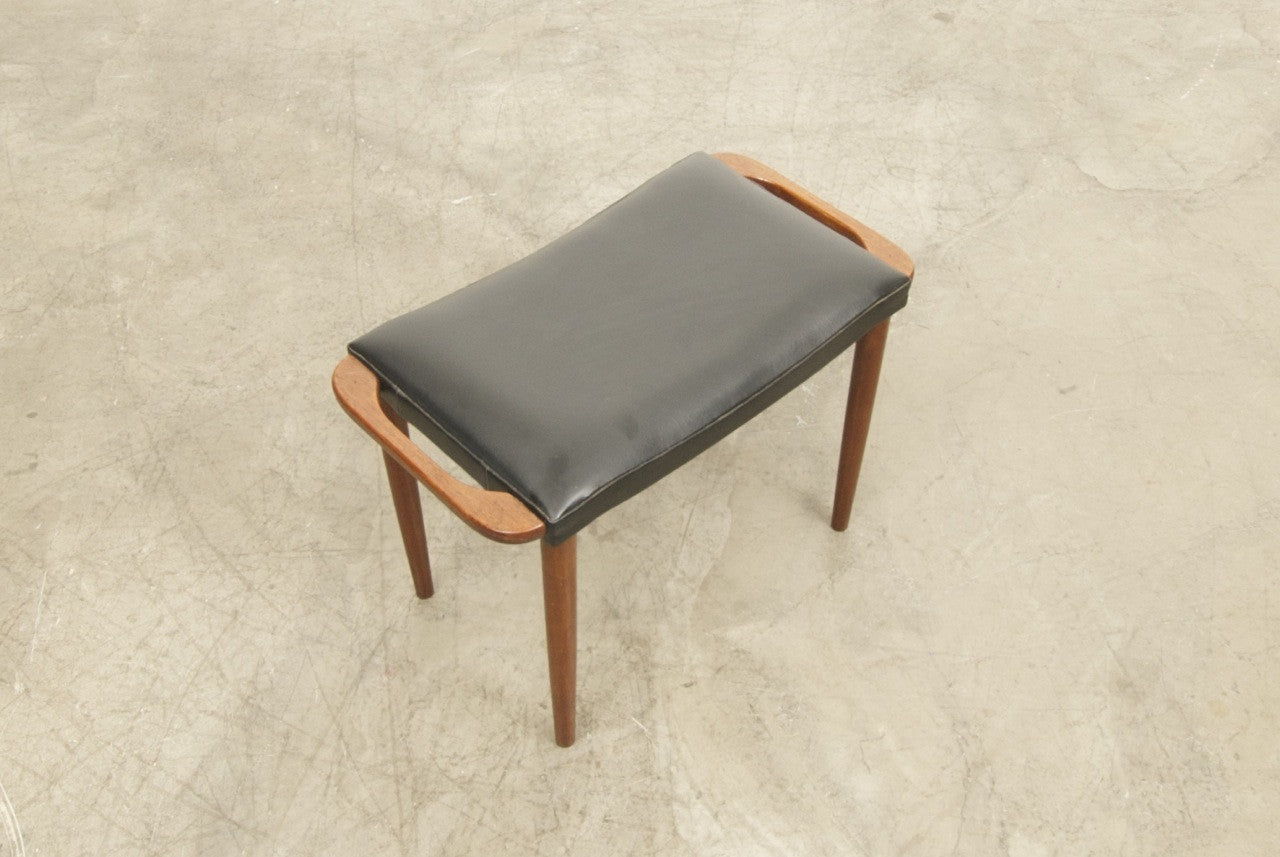 Foot stool in teak with vinyl upholstery