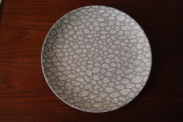 Pebble plate by Poole Pottery