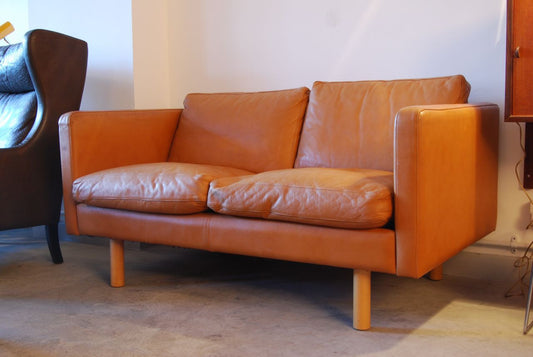 Two seat leather sofa by HJ