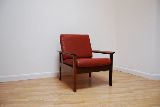 Lounge chair in rosewood and leather